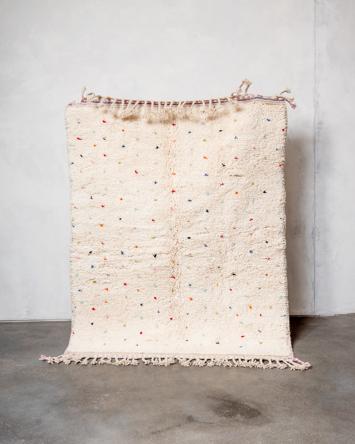 Modern, designer, handcrafted Berber rug from Morocco. Beniourain carpet with beautiful colours and patterns and fluffy wool texture.